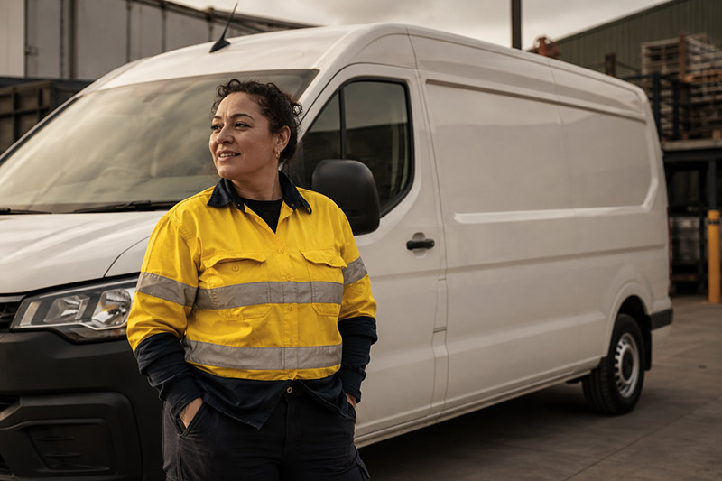 Confident worker in industrial setting