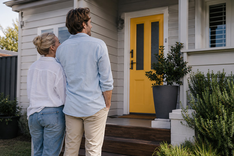 Couple enjoying a calm home entrance