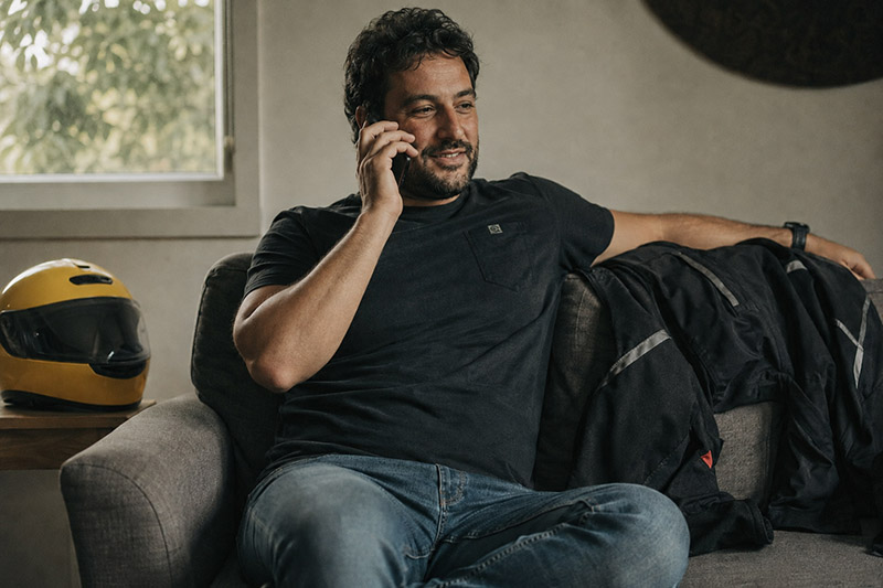 Relaxed phone call in cozy living room
